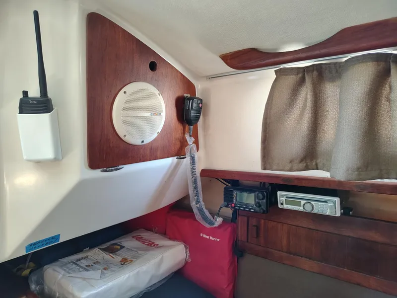 Slide: The Image of Interior of 1981 Sabre 28 sailboat with radio equipment and safety gear. - 13