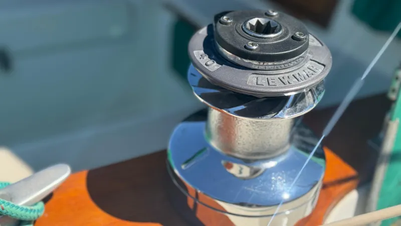 Slide: The Image of Winch on 1981 Sabre 28 sailboat, featuring Lewmar branding. - 49