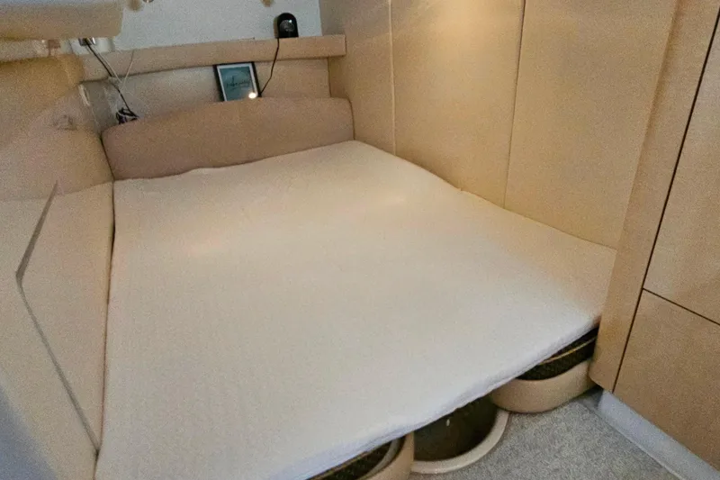 Slide: The Image of Interior cabin of 2001 Maxum 3500 SCR yacht with cozy bed setup. - 35