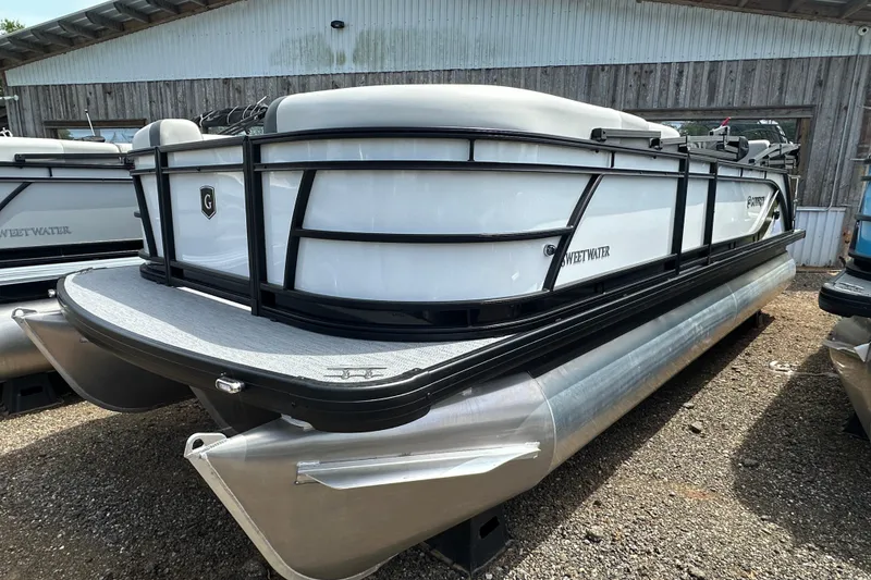 The Image of 2026 Godfrey Sweetwater 2286 SFLC pontoon boat parked outdoors. - 0