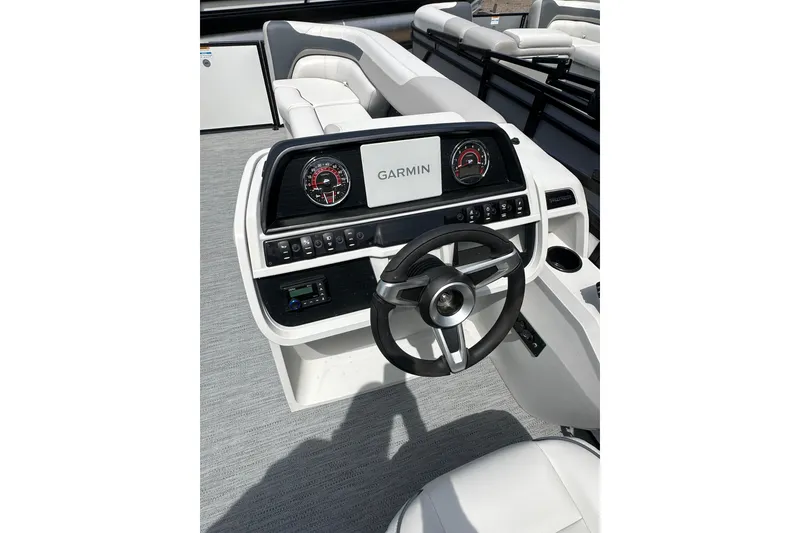 Slide: The Image of Steering console of 2026 Godfrey Sweetwater 2286 SFLC boat with Garmin display. - 12