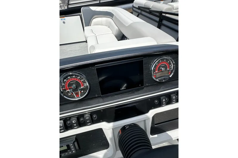 Slide: The Image of Dashboard of 2026 Godfrey Sweetwater 2286 SFLC boat with modern controls and seating. - 13