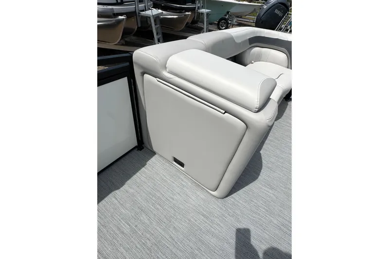 Slide: The Image of 2026 Godfrey Sweetwater 2286 SFLC boat interior with gray cushioned seating. - 15