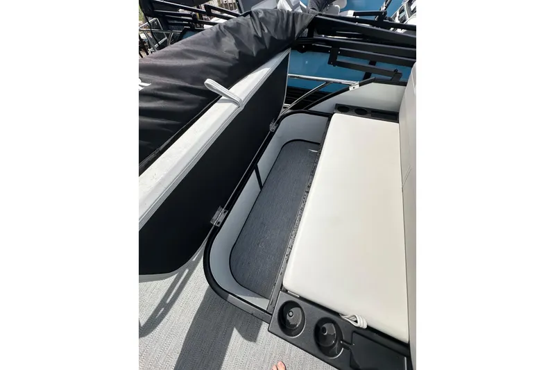 Slide: The Image of Interior view of 2026 Godfrey Sweetwater 2286 SFLC boat with seating and cup holders. - 25