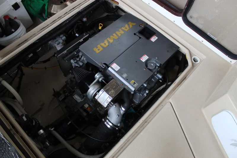 Slide: The Image of Engine compartment of a 2011 Ranger Tugs R-27 with Yanmar engine visible. - 21