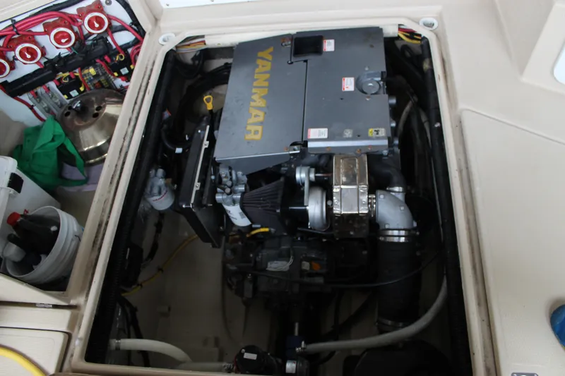 Slide: The Image of Engine compartment of 2011 Ranger Tugs R-27 with Yanmar engine visible. - 23
