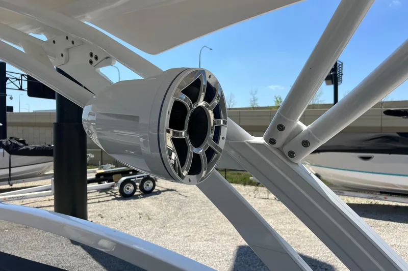 Slide: The Image of Close-up of a 2022 Yamaha 275 SD boat speaker mounted on a sleek frame. - 14