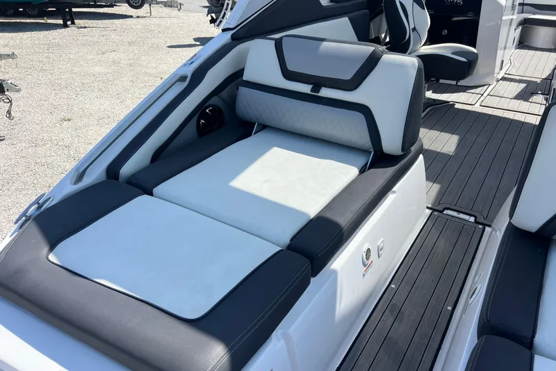 Slide: The Image of 2022 Yamaha 275 SD boat interior with sleek seating and modern design. - 6