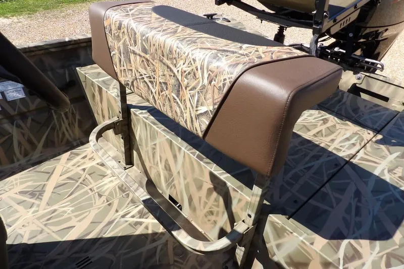 Slide: The Image of Crestliner 1860 Retriever CC 2026 boat seat with camouflage pattern and brown accents. - 20