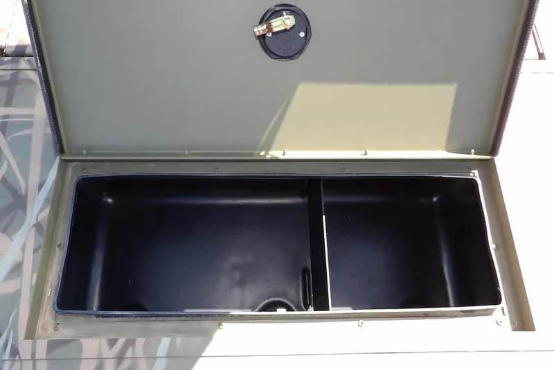 Slide: The Image of Open storage compartment on 2026 Crestliner 1860 Retriever CC boat. - 23