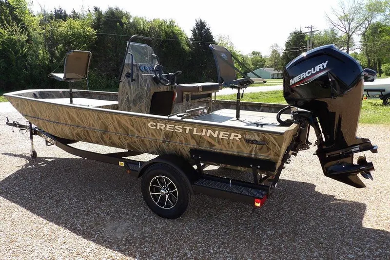Slide: The Image of 2026 Crestliner 1860 Retriever CC boat with Mercury outboard motor on a trailer. - 6