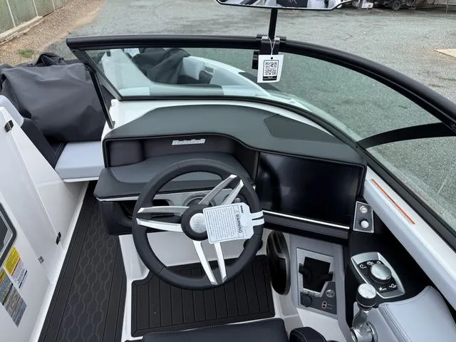 Slide: The Image of Interior view of the 2026 MasterCraft XT22 boat cockpit. - 13