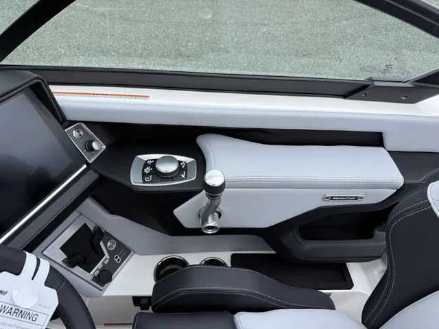 Slide: The Image of Interior of 2026 MasterCraft XT22 with modern control panel. - 15