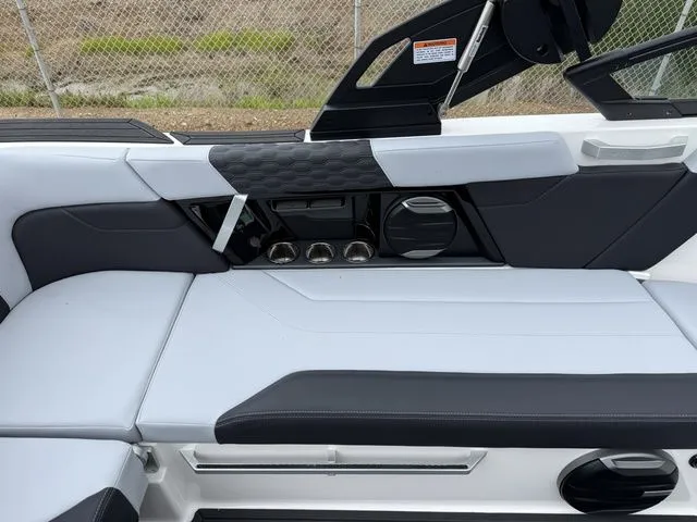 Slide: The Image of Interior of 2026 MasterCraft XT22 with modern seating and speakers. - 21