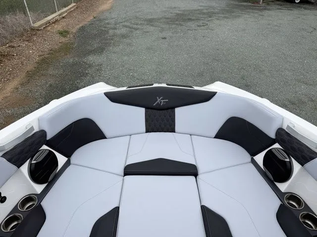Slide: The Image of Interior of 2026 MasterCraft XT22 boat with stylish seating. - 26