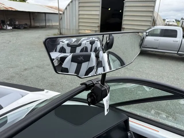 Slide: The Image of Rearview mirror of a 2026 MasterCraft XT22 boat showing interior. - 28