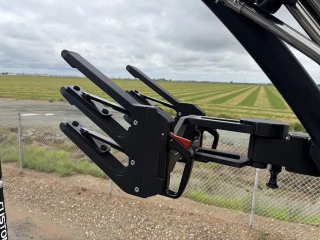 Slide: The Image of MasterCraft XT22 2026 wakeboard rack against scenic landscape. - 29