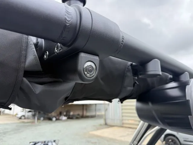 Slide: The Image of Close-up of a camera on a 2026 MasterCraft XT22 boat. - 31