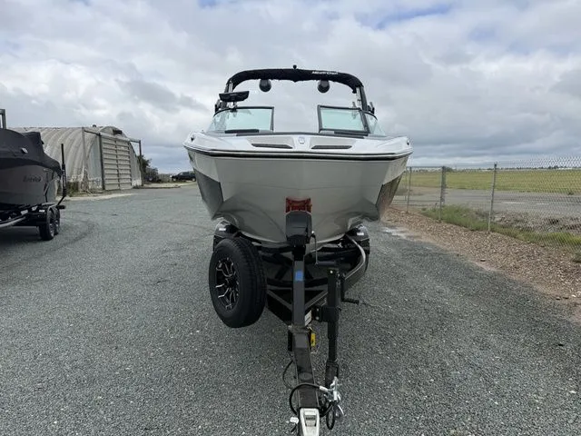 Slide: The Image of 2026 MasterCraft XT22 boat on trailer, front view. - 7