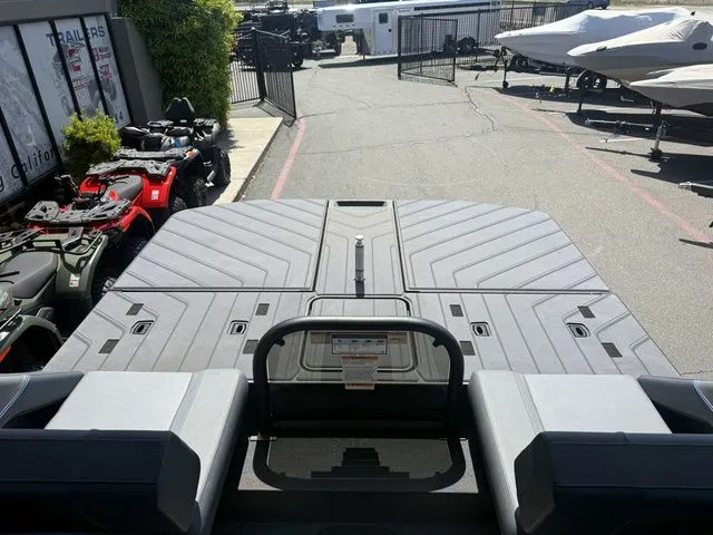 Slide: The Image of Manitou 24' Explore Switchback Stealth 2025 - 24