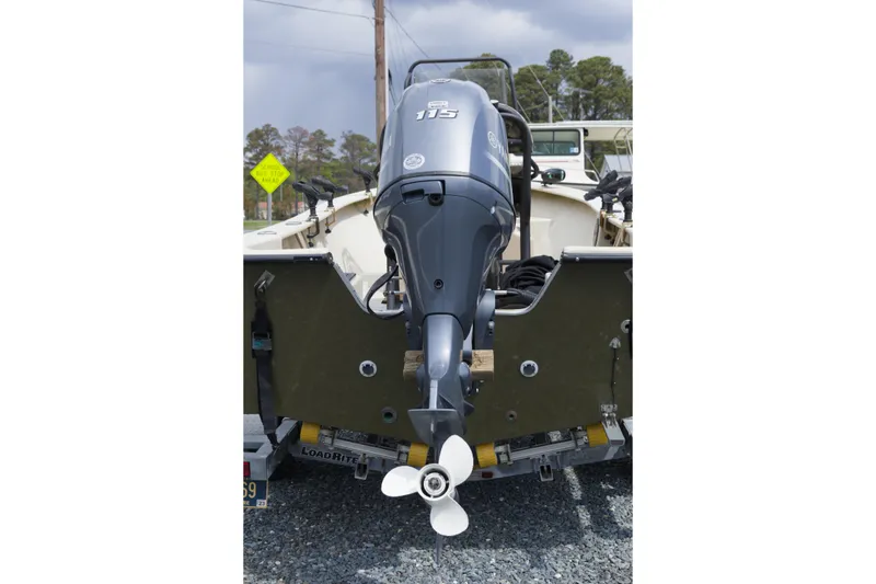 Slide: The Image of 2018 May-Craft 1800 Skiff with Yamaha 115 outboard motor, rear view. - 4