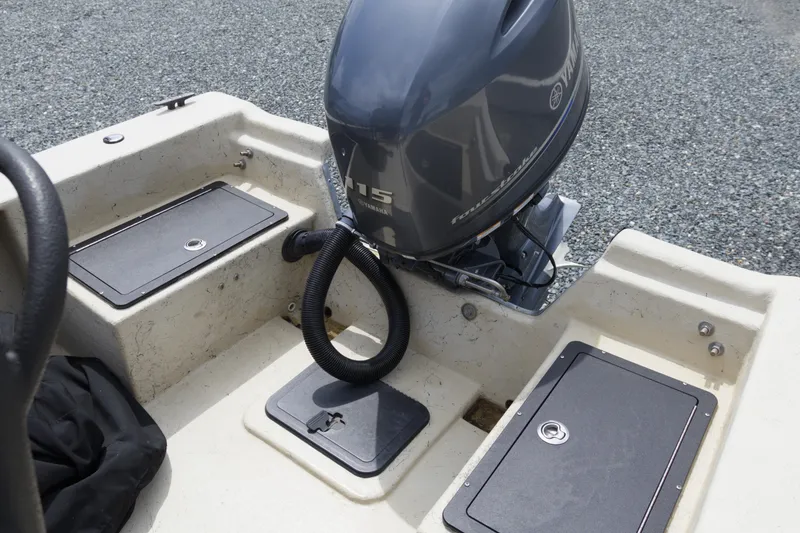 Slide: The Image of 2018 May-Craft 1800 Skiff with Yamaha 115 outboard motor, rear deck view. - 8