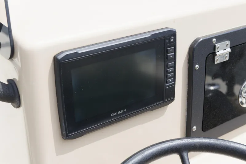 Slide: The Image of Garmin display on 2018 May-Craft 1800 Skiff dashboard, close-up view. - 9