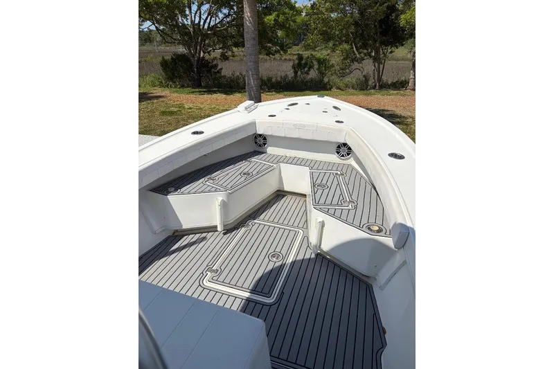 Slide: The Image of 2021 Pair Customs 24 Center Console MV boat with spacious deck and seating. - 8