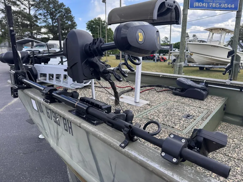 Slide: The Image of 2007 Tracker Grizzly 1754 boat with equipment on parking lot. - 4