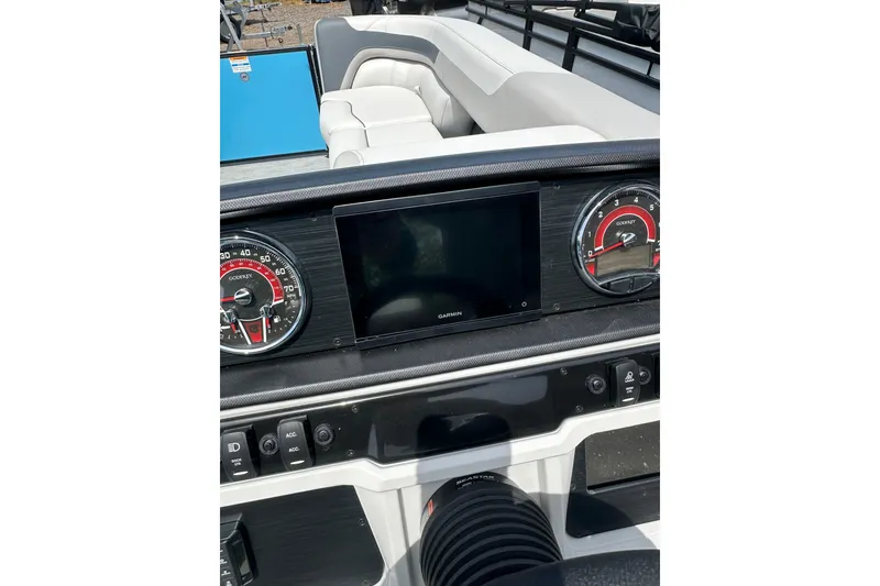 Slide: The Image of Dashboard of 2026 Godfrey Sweetwater 2286 SFLC boat with Garmin display and gauges. - 13
