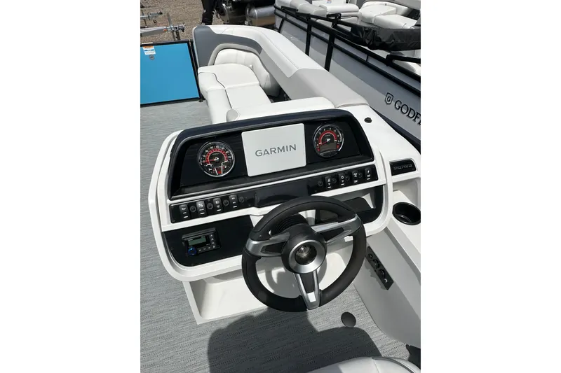 Slide: The Image of 2026 Godfrey Sweetwater 2286 SFLC boat dashboard with Garmin navigation system. - 15