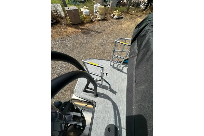 Slide: The Image of 2026 Godfrey Sweetwater 2286 SFLC boat deck with ladder and equipment. - 21