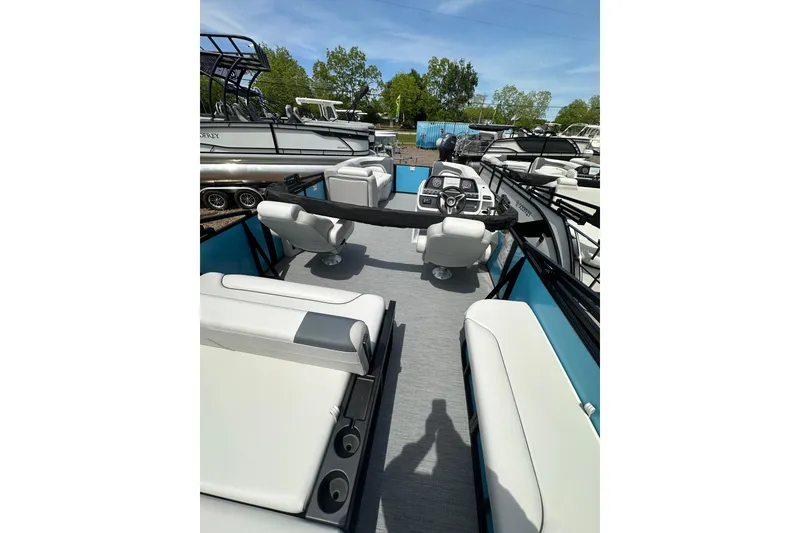 Slide: The Image of 2026 Godfrey Sweetwater 2286 SFLC pontoon boat interior with seating and helm. - 24