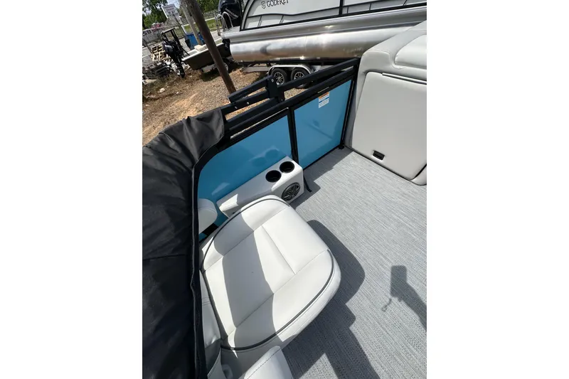 Slide: The Image of 2026 Godfrey Sweetwater 2286 SFLC boat interior with seating and cup holders. - 26