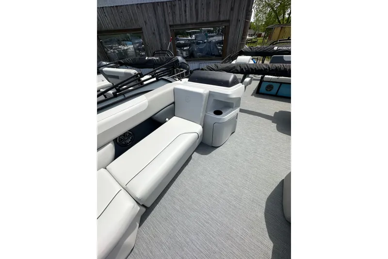 Slide: The Image of 2026 Godfrey Sweetwater 2286 SFLC boat interior with sleek seating and modern design. - 29