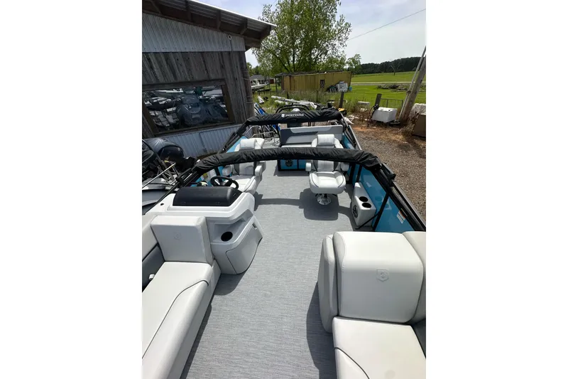 Slide: The Image of 2026 Godfrey Sweetwater 2286 SFLC pontoon boat with spacious seating and modern design. - 30