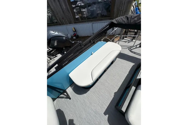 Slide: The Image of 2026 Godfrey Sweetwater 2286 SFLC boat interior with seating and Yamaha engine. - 32