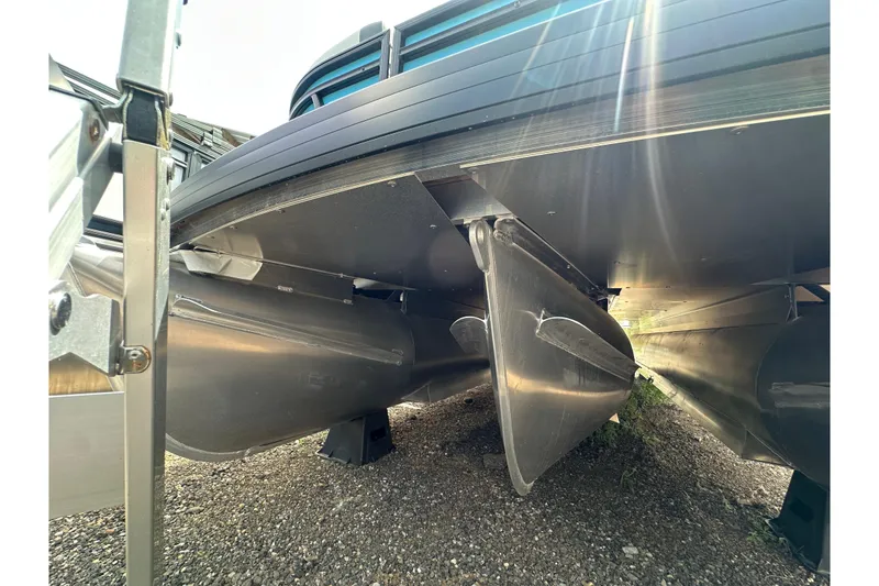 Slide: The Image of Underneath view of 2026 Godfrey Sweetwater 2286 SFLC pontoon boat with sunlight reflections. - 35