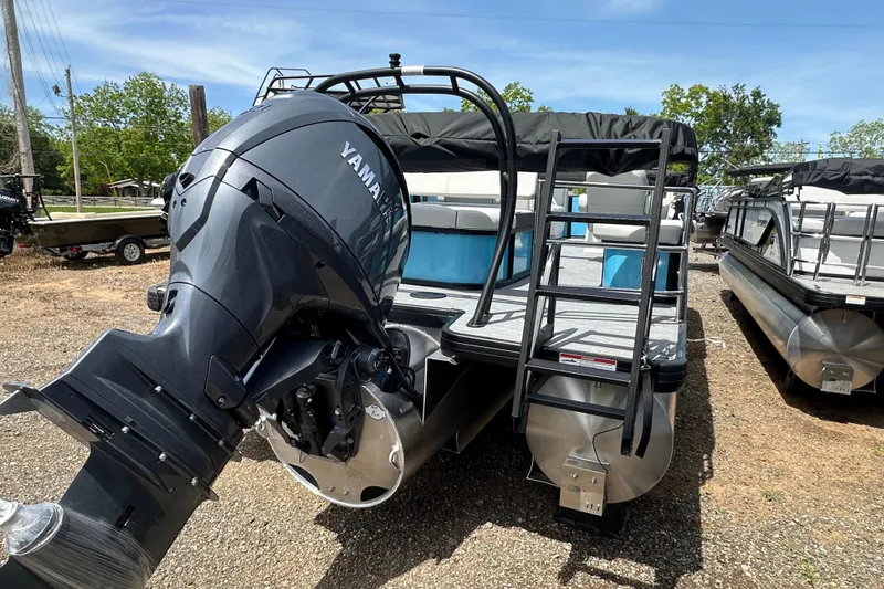 Slide: The Image of 2026 Godfrey Sweetwater 2286 SFLC pontoon boat with Yamaha outboard motor, rear view. - 5