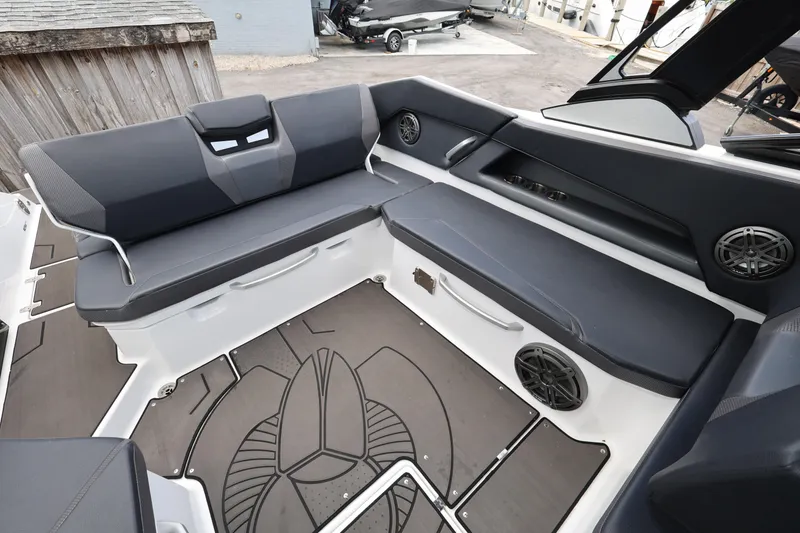 Slide: The Image of 2024 Scarab 285 ID boat interior with sleek seating and modern design elements. - 10