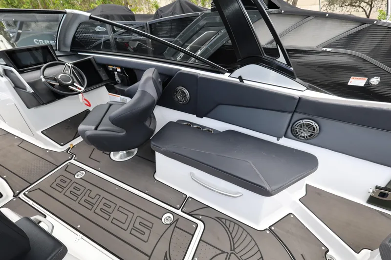 Slide: The Image of 2024 Scarab 285 ID boat interior with sleek seating and modern dashboard design. - 11