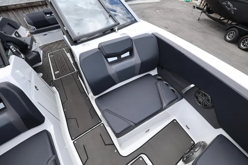 Slide: The Image of 2024 Scarab 285 ID boat interior with sleek seating and modern design. - 16