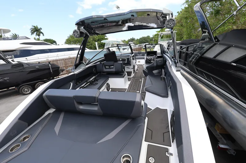 Slide: The Image of 2024 Scarab 285 ID boat interior with sleek seating and modern design features. - 6