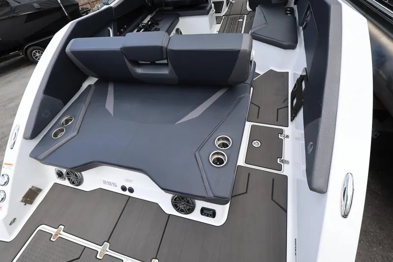 Slide: The Image of 2024 Scarab 285 ID boat interior with sleek seating and modern design elements. - 7