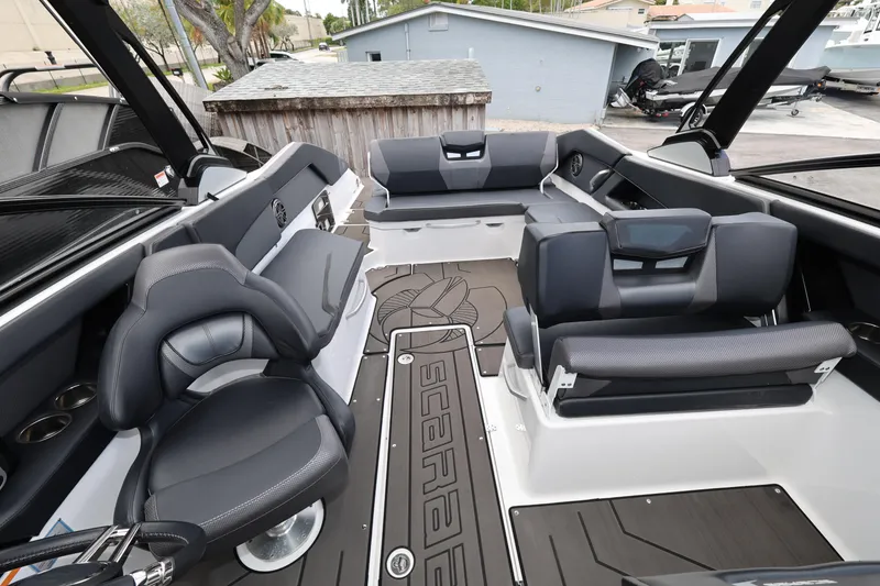 Slide: The Image of 2024 Scarab 285 ID boat interior with sleek seating and modern design. - 8