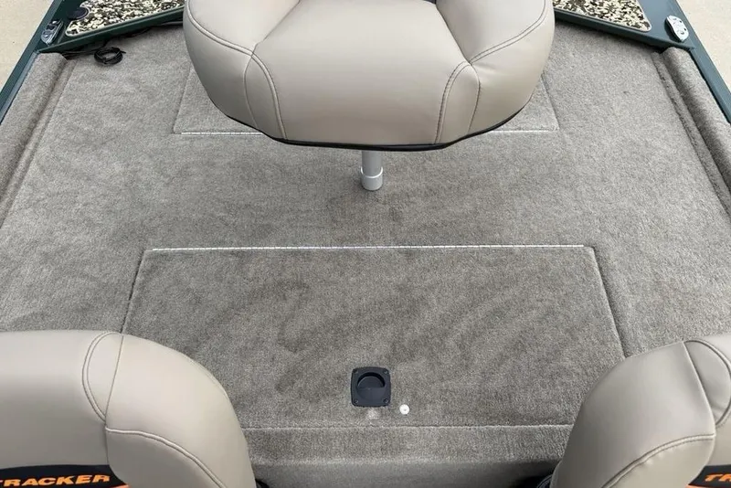 Slide: The Image of Interior of 2026 Tracker Bass Tracker Classic Limited boat with beige seating. - 16
