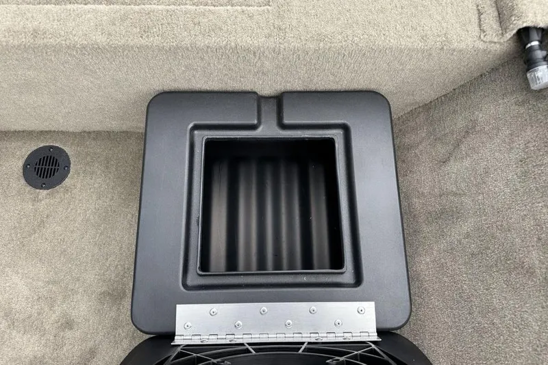 Slide: The Image of Storage compartment in 2026 Tracker Bass Tracker Classic Limited boat interior. - 18