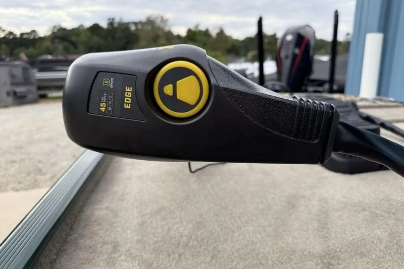 Slide: The Image of Close-up of a 2026 Tracker Bass Tracker Classic Limited boat control handle. - 2