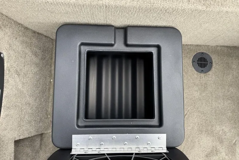 Slide: The Image of Storage compartment in 2026 Tracker Bass Tracker Classic Limited boat interior. - 23