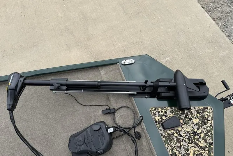 Slide: The Image of 2026 Tracker Bass Tracker Classic Limited boat with trolling motor on deck. - 3